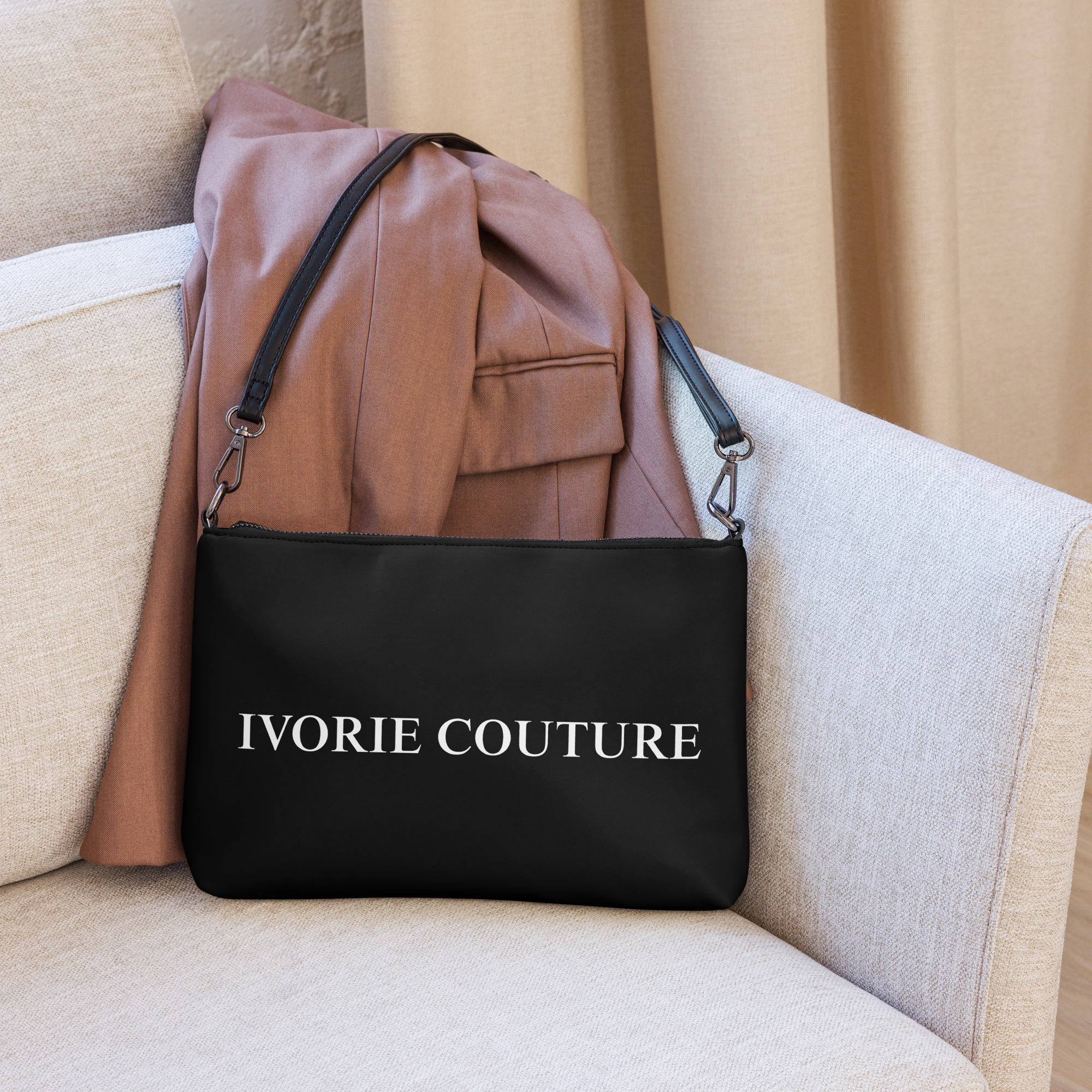 Ivorie Couture Signature Noir Crossbody Handbag Crossbody bag black on the couch